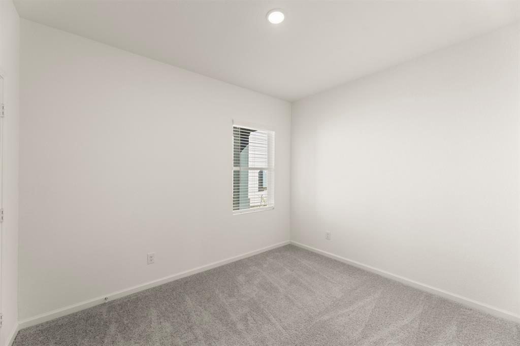 501 Merced River Lane Anna, TX 75409 - Photo 12 of 28 an empty room with a window