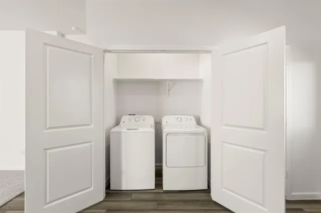 a utility room with dryer and washer