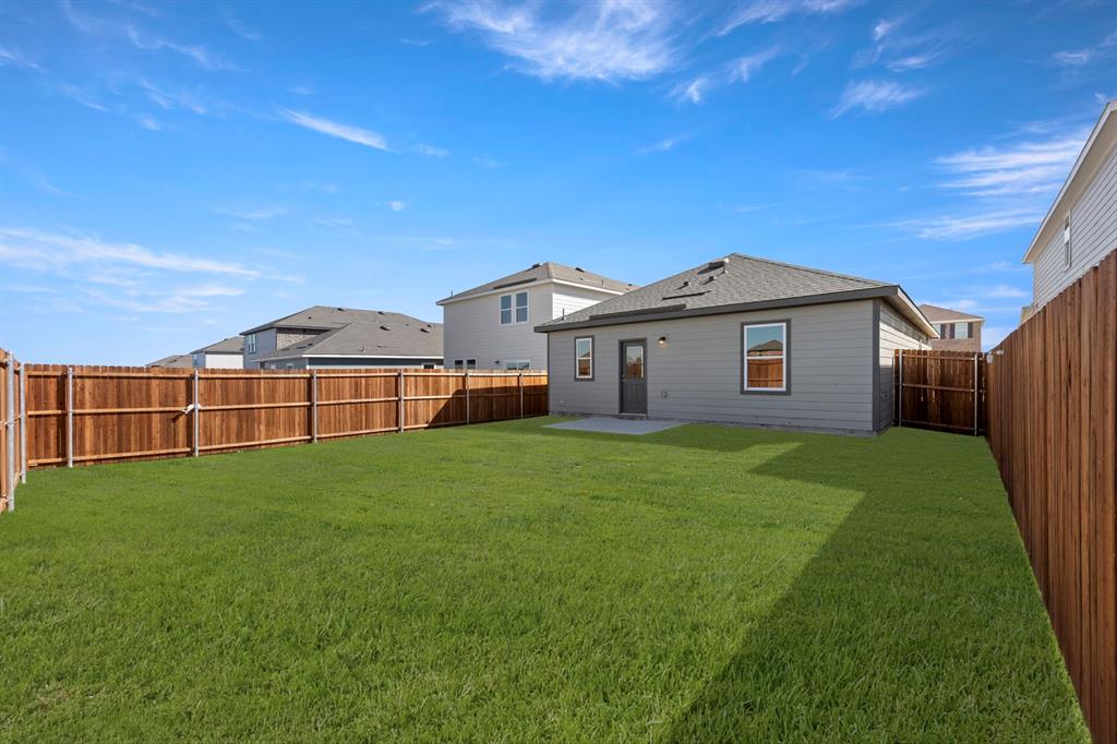 501 Merced River Lane Anna, TX 75409 - Photo 27 of 28 a view of a house with backyard and garden