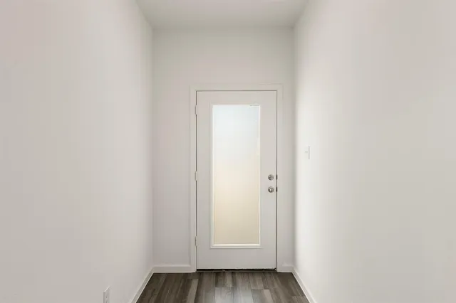 a view of bathroom with wooden floor