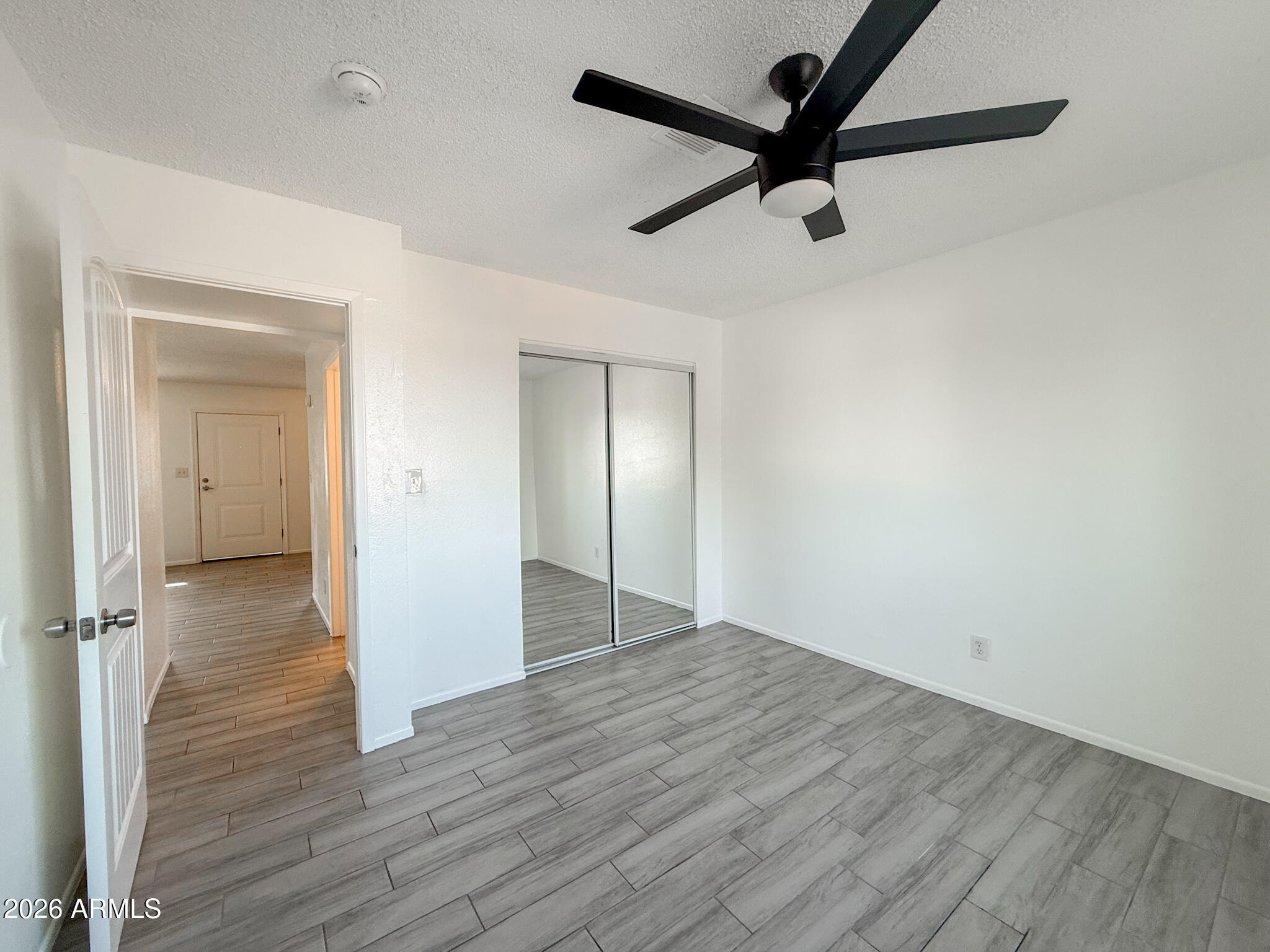 349 North 11th Street, Unit 207 Phoenix, AZ 85006 - Photo 14 of 20 wooden floor in an empty room