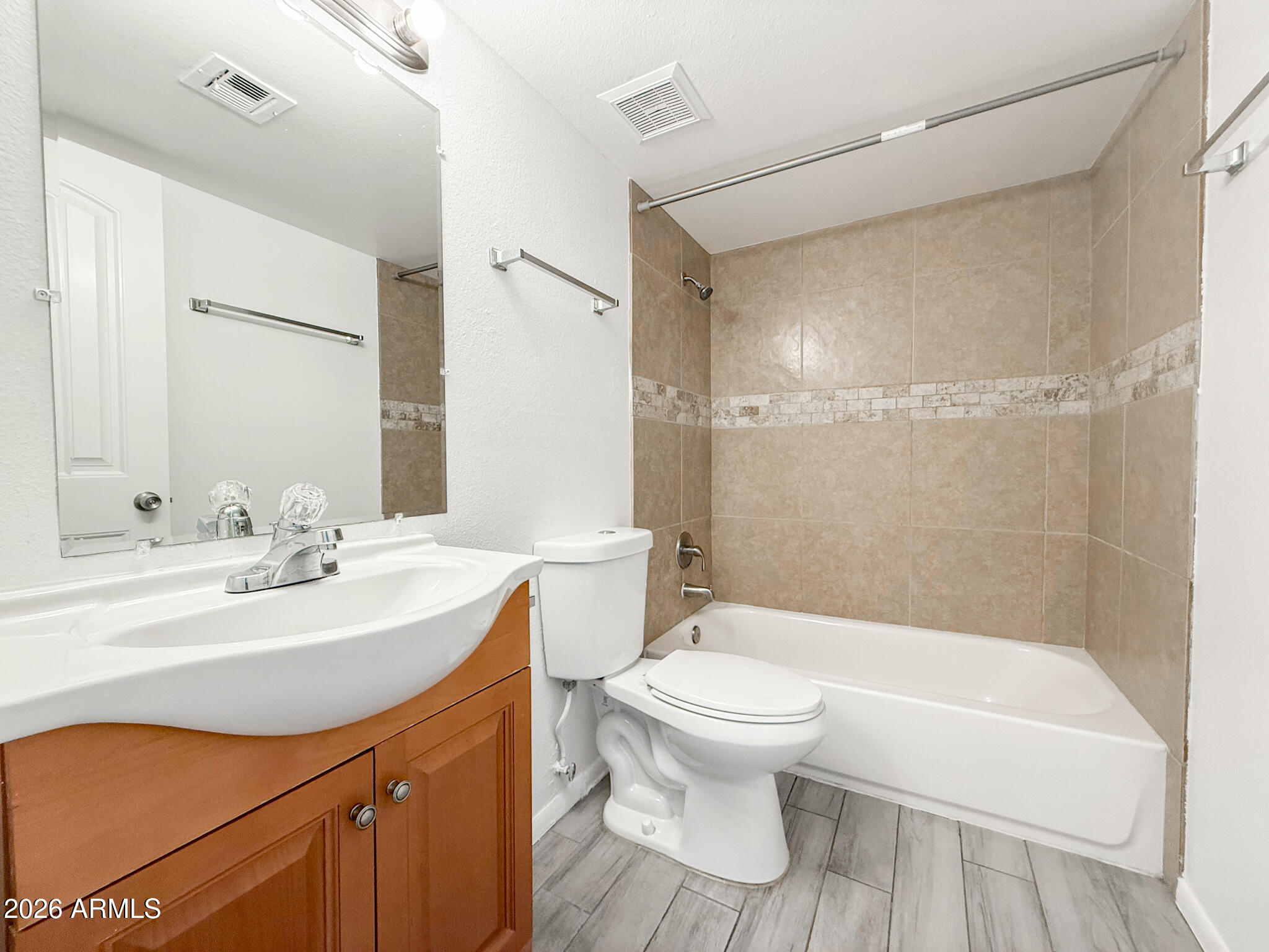 349 North 11th Street, Unit 207 Phoenix, AZ 85006 - Photo 10 of 20 a bathroom with a sink toilet and shower