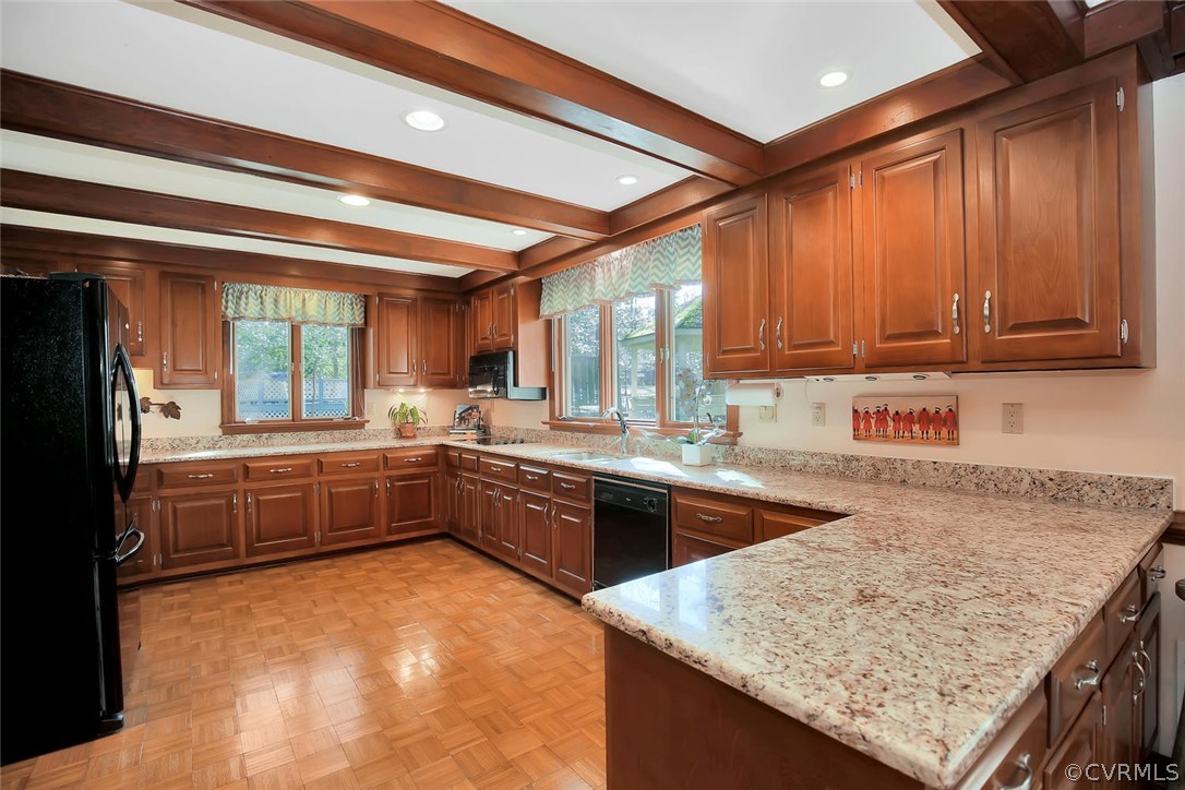3906 Timber Ridge Road Midlothian, VA 23112 - Photo 5 of 15 a kitchen with stainless steel appliances granite countertop a sink window and cabinets