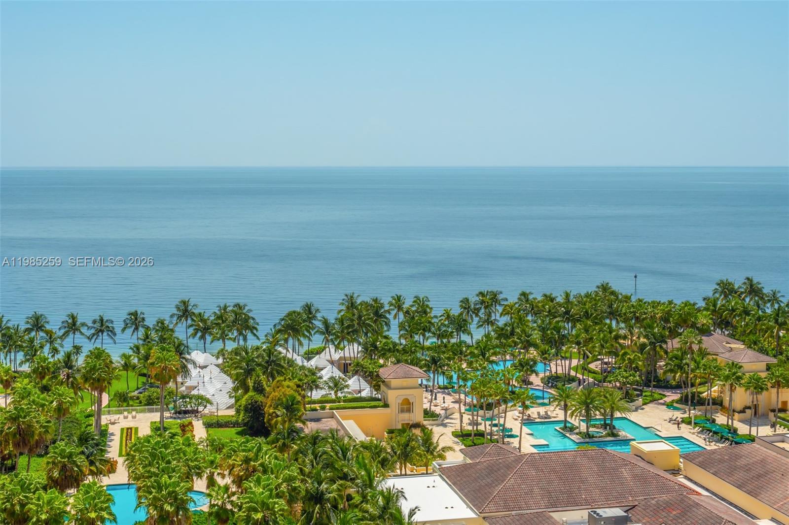 781 Crandon Boulevard, Unit 1603 Key Biscayne, FL 33149 - Photo 1 of 34 a view of a lake