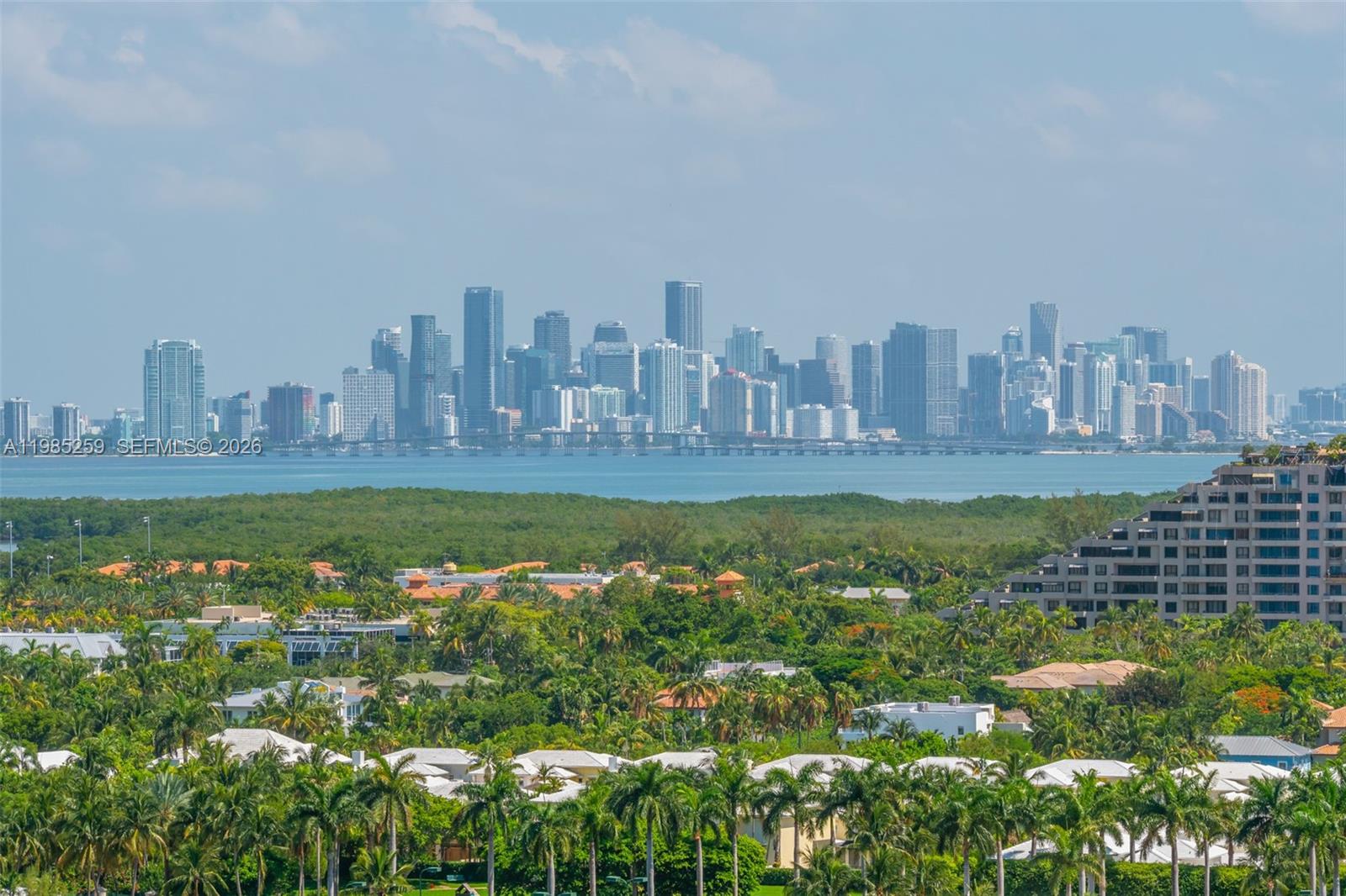781 Crandon Boulevard, Unit 1603 Key Biscayne, FL 33149 - Photo 24 of 34 a view of a city with tall buildings in the background