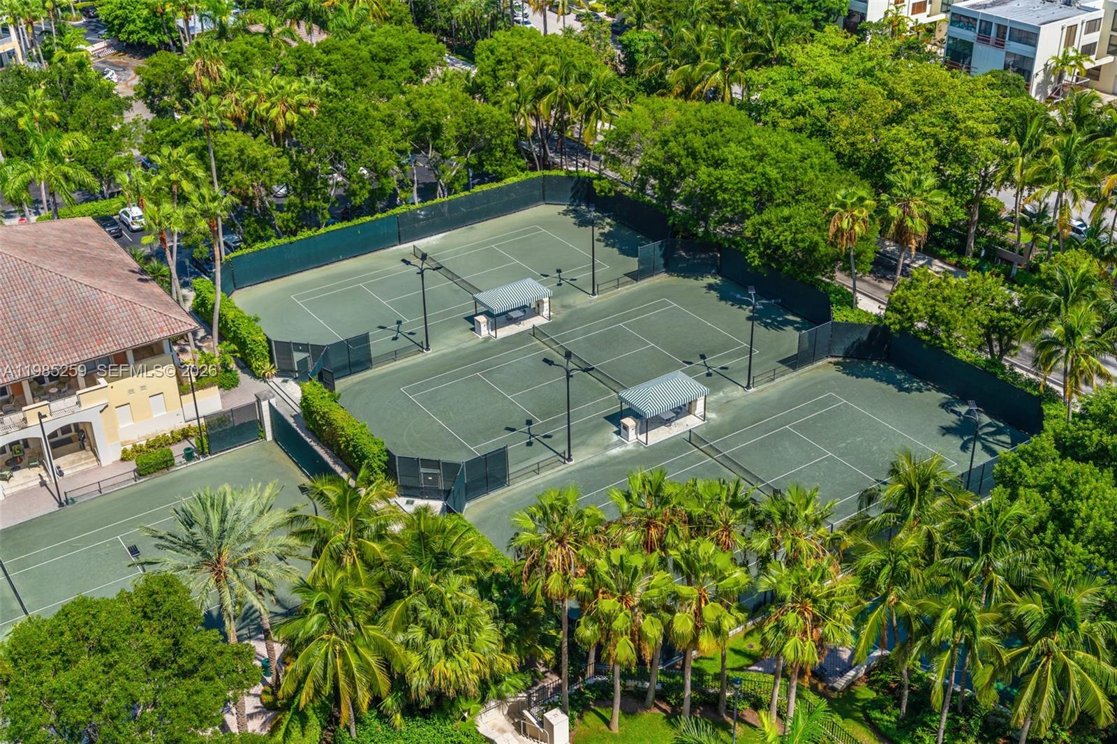 781 Crandon Boulevard, Unit 1603 Key Biscayne, FL 33149 - Photo 29 of 34 an aerial view of a house with a yard