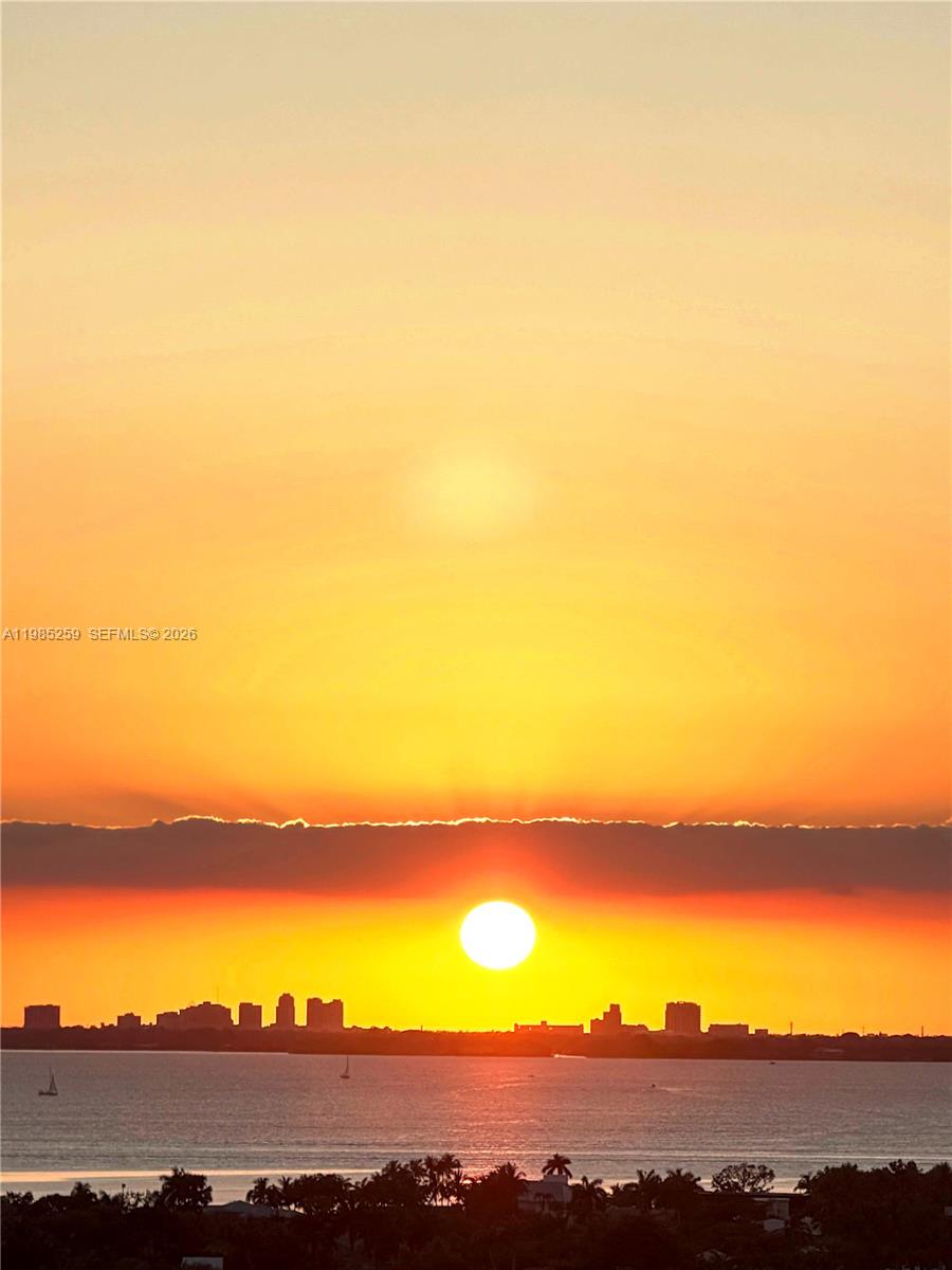 781 Crandon Boulevard, Unit 1603 Key Biscayne, FL 33149 - Photo 33 of 34 a view of sunset