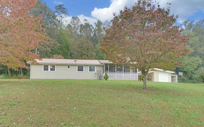4775 Pisgah Road Andrews, NC 28901 - Photo 1 of 1 a front view of a house with a garden