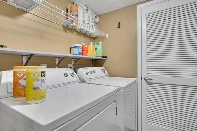 a view of livingroom with hardwood floor and a ceiling fan