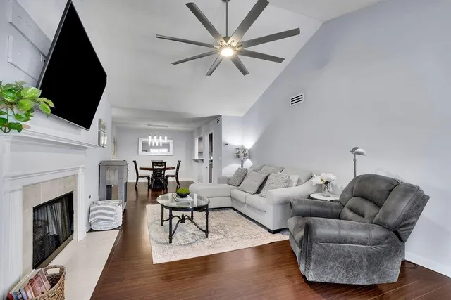 a kitchen with stainless steel appliances granite countertop a sink stove and microwave