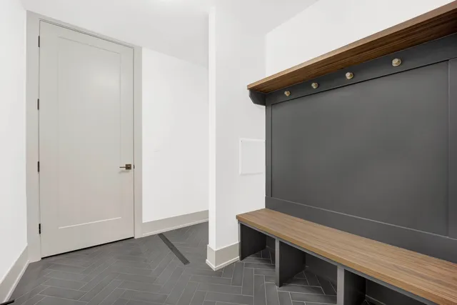 a room with a table and wooden floor