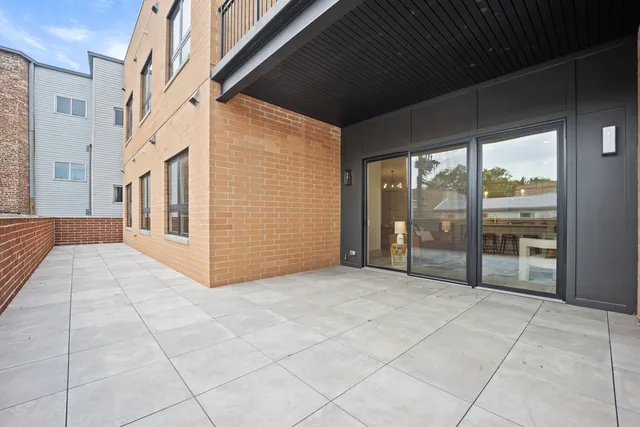 a view of a porch with seating space