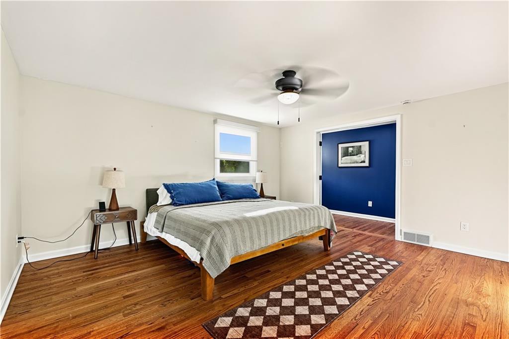 736 Pinetree Road Pittsburgh, PA 15243 - Photo 22 of 43 Primary Bedroom is seperated form guest rooms with a private door entrance creating a relaxing retreat. The oversized room is plenty large enough for all furniture essentials and still allows room for to create a sitting area within the room.