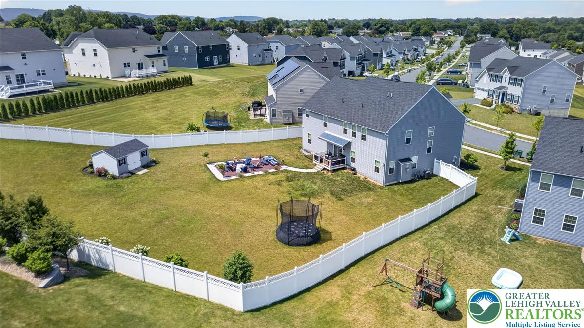 3952 Orth Street Bethlehem, PA 18020 - Photo 57 of 60 A spacious, fenced backyard offers ample green space and an inviting outdoor entertainment area.