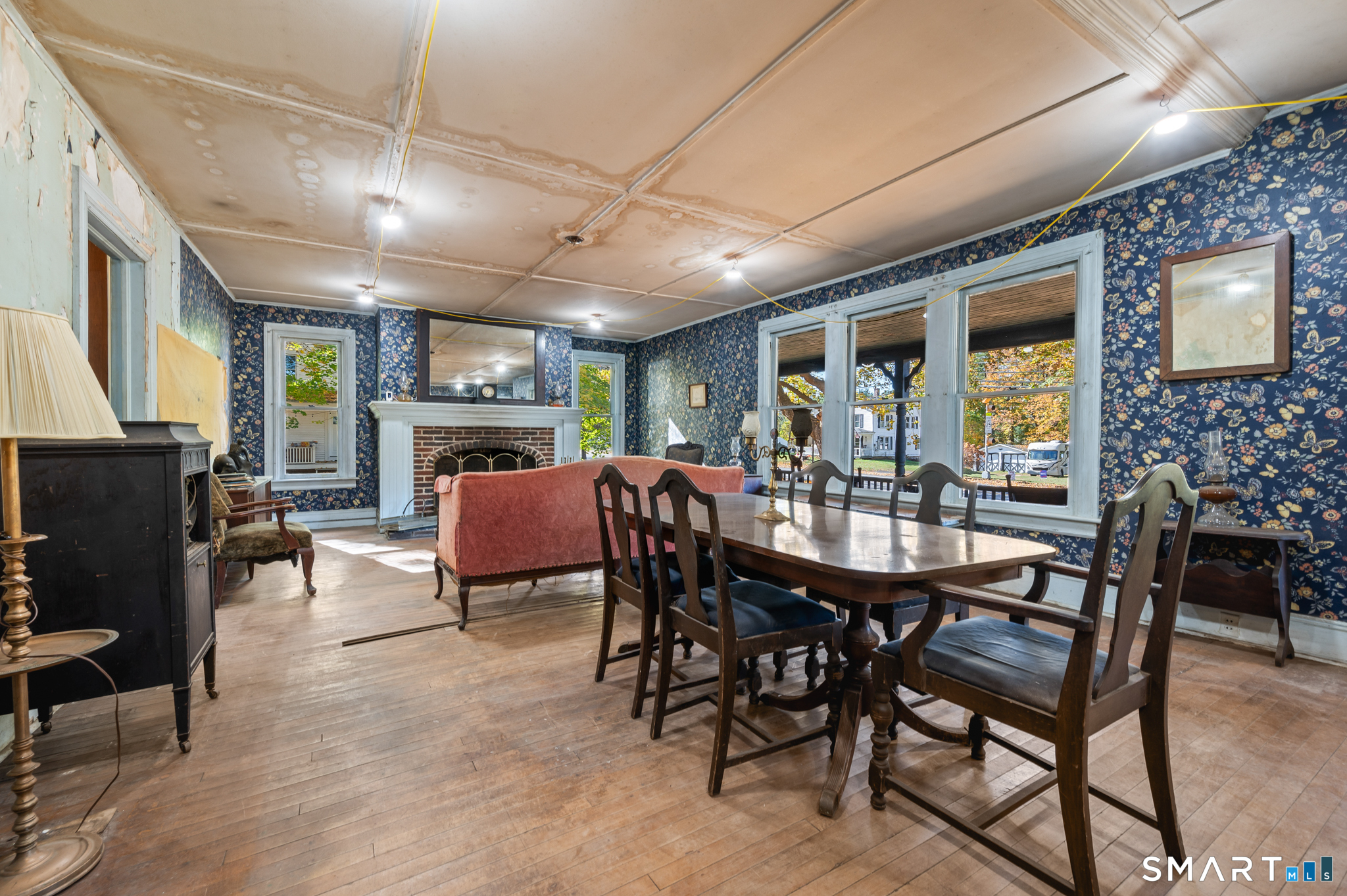 124 River Road Willington, CT 06279 - Photo 14 of 40 a view of a dining room with furniture window and wooden floor