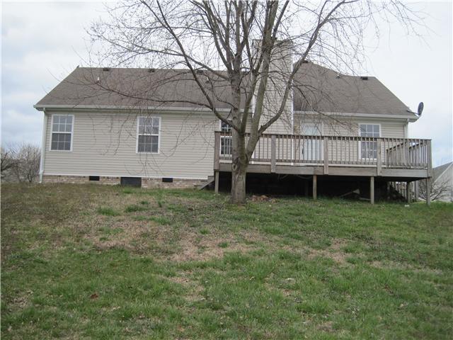 1954 Portway Road Spring Hill, TN 37174 - Photo 15 of 16 Spaciuos deck on the back and shade tree.