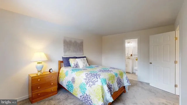 a bathroom with a sink a vanity and tub