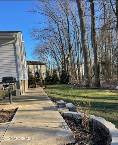 a view of a park that has a car parked on the side of it
