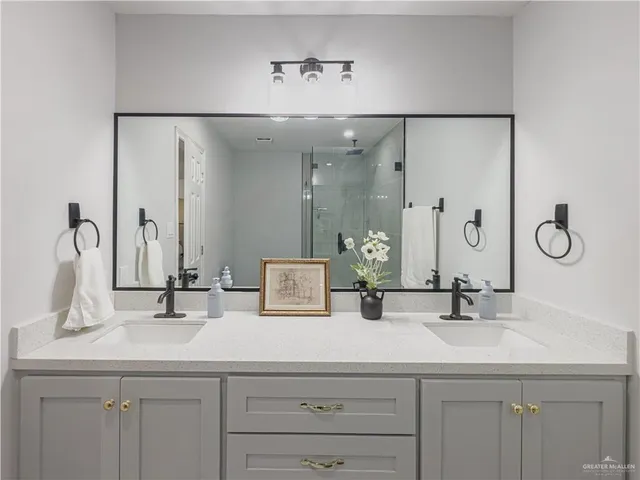 a bathroom with a shower and toilet