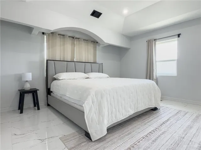 a bathroom with a shower and toilet