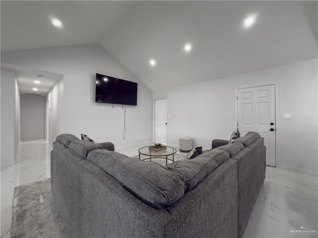 801 Ray Street Donna, TX 78537 - Photo 6 of 27 a living room with furniture and a flat screen tv