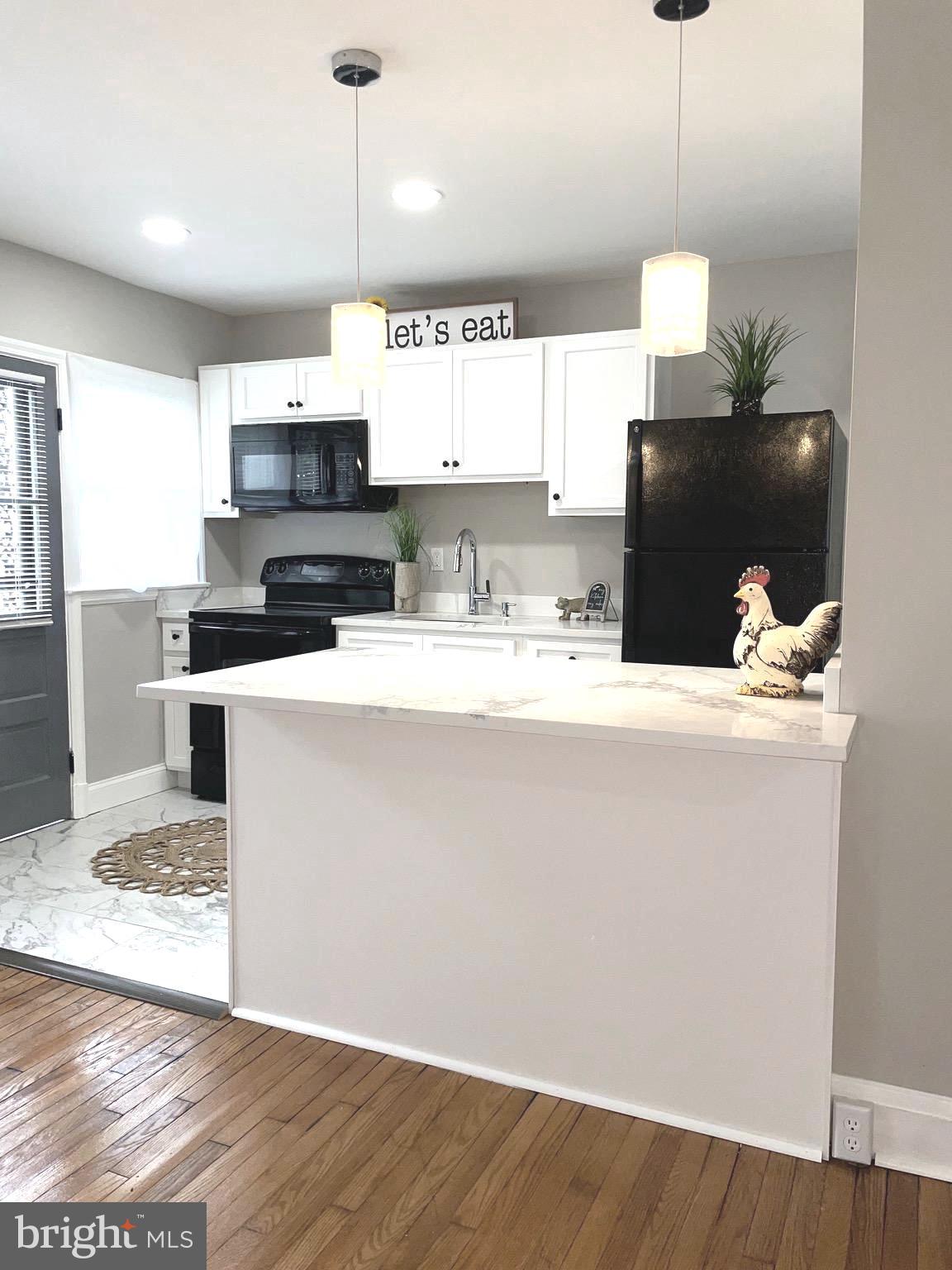5166 Stafford Road Baltimore, MD 21229 - Photo 1 of 70 Beautiful quartz updated kitchen