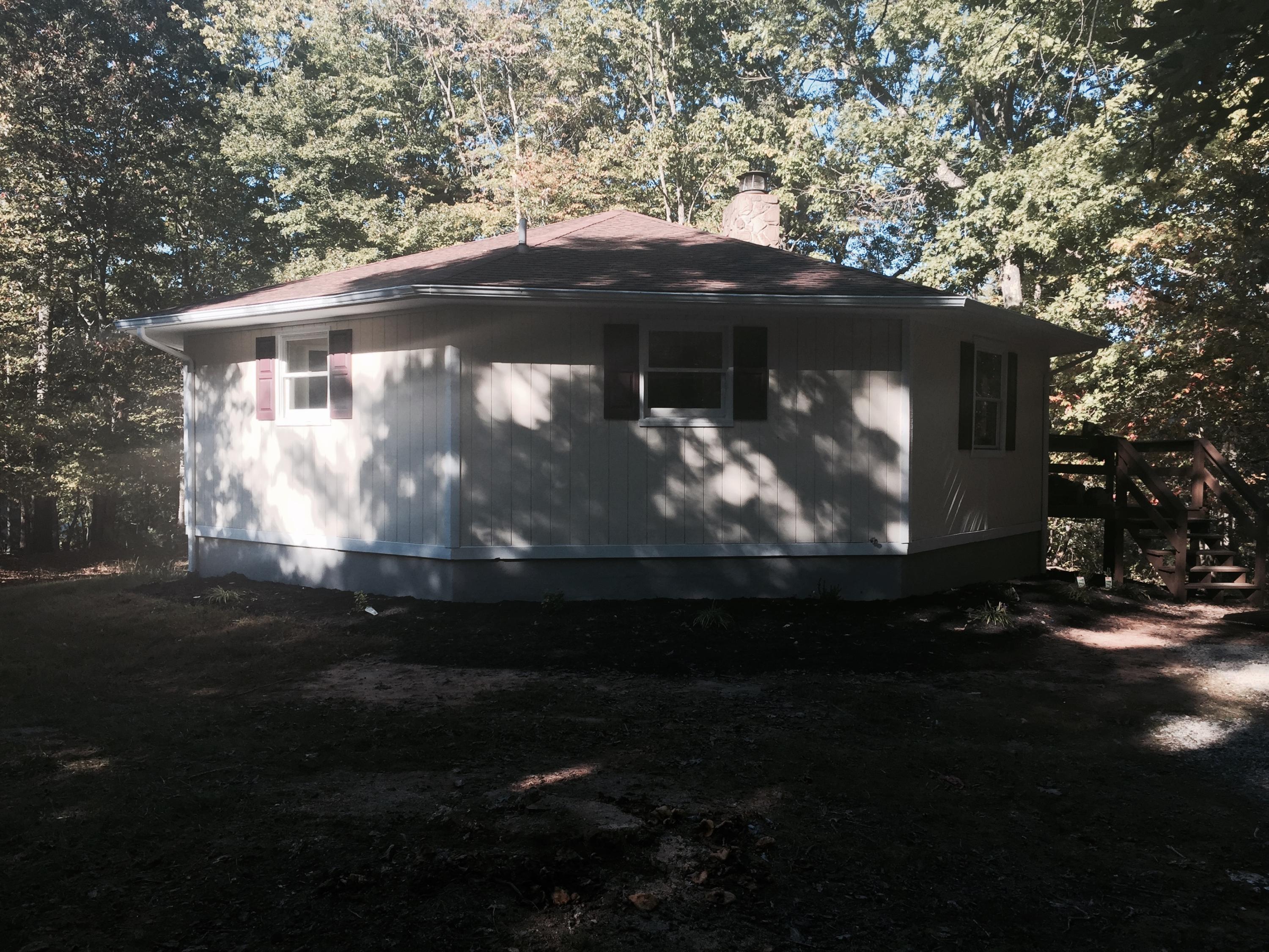 884 Isolane Road Callaway, VA 24067 - Photo 3 of 10 a view of house with backyard