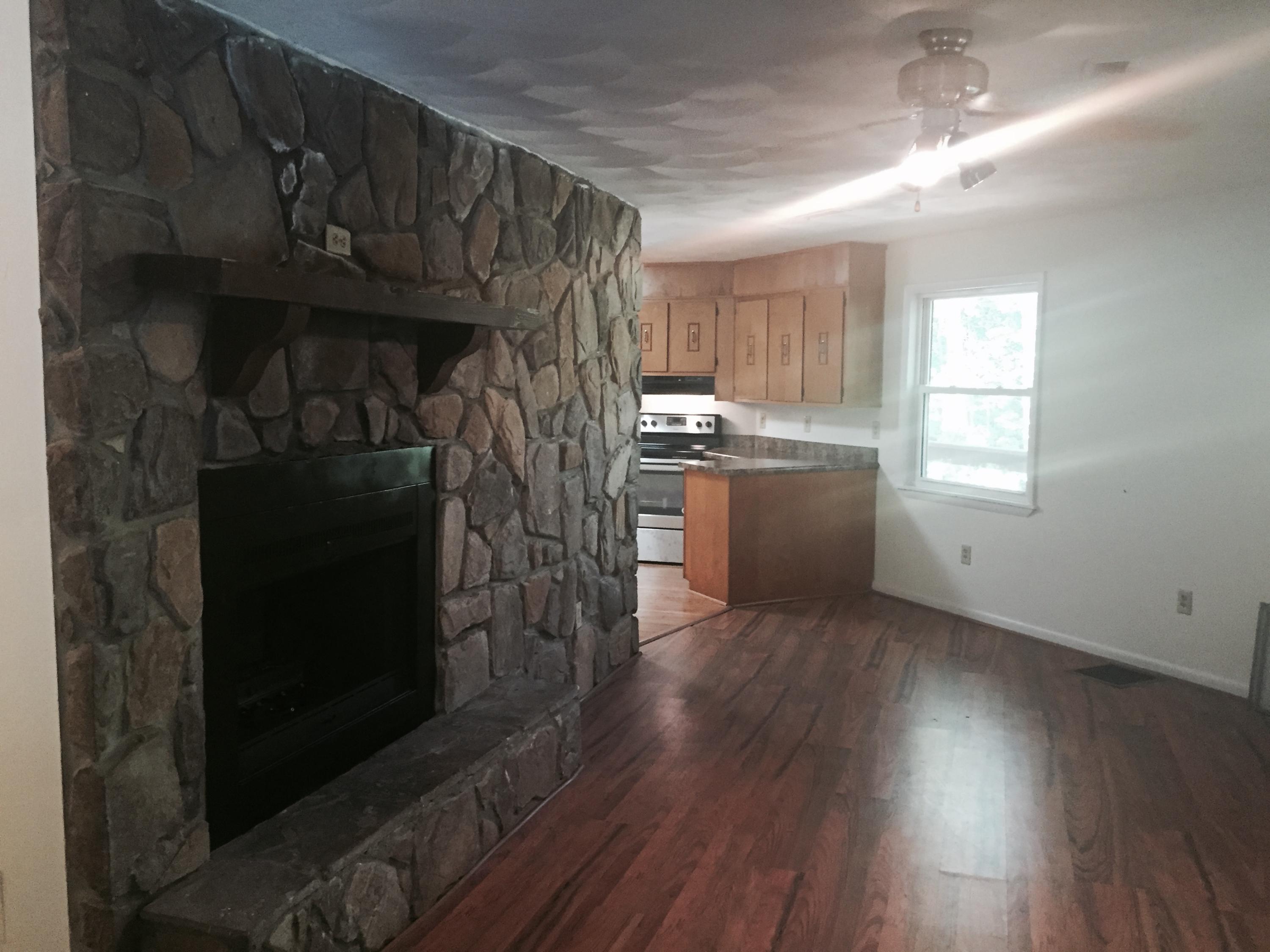 884 Isolane Road Callaway, VA 24067 - Photo 5 of 10 a kitchen with cabinets and wooden floor