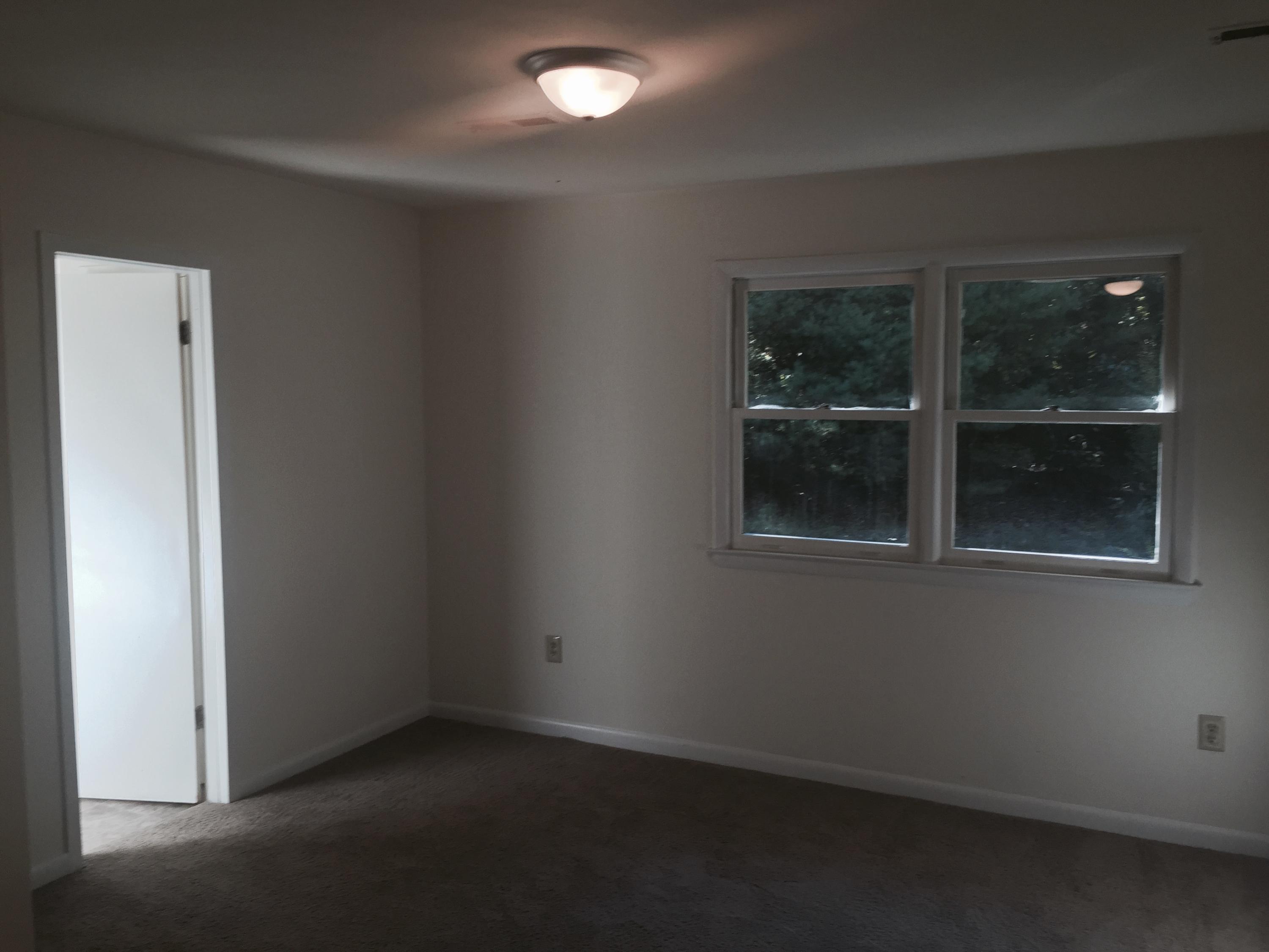 884 Isolane Road Callaway, VA 24067 - Photo 8 of 10 an empty room with a window