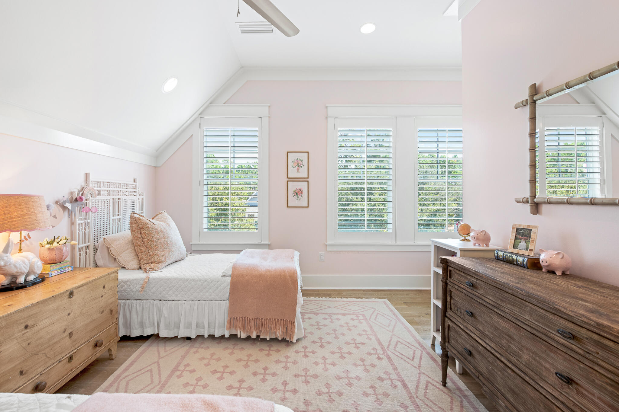 16 Medley Street Inlet Beach, FL 32461 - Photo 54 of 84 a spacious bedroom with a bed and wooden floor