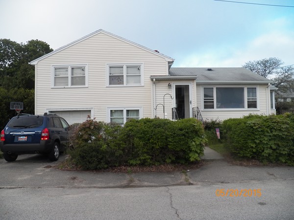 246 Kingsley Road Hull, MA 02045 - Photo 1 of 14 a front view of a house with a garden