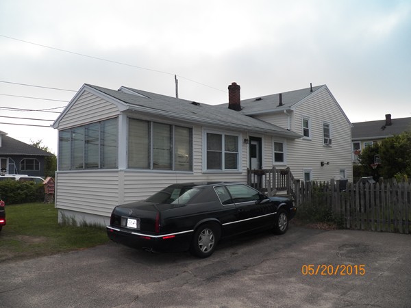 246 Kingsley Road Hull, MA 02045 - Photo 2 of 14 a car parked in front of a house