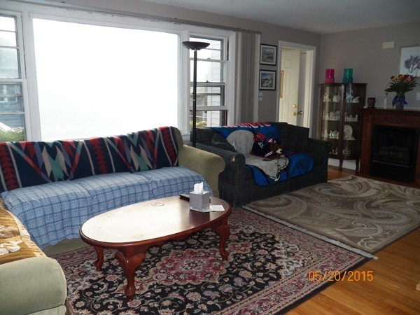 246 Kingsley Road Hull, MA 02045 - Photo 6 of 14 a living room with furniture and a rug