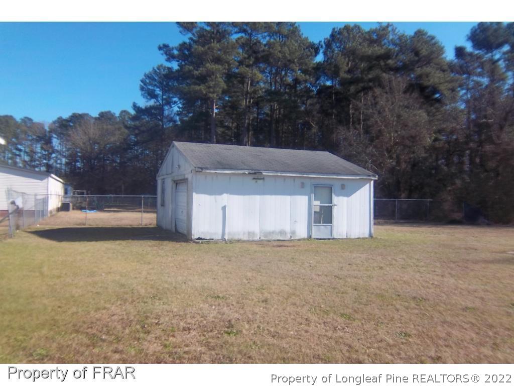 6532 Sandy Creek Road Stedman, NC 28391 - Photo 4 of 5 a view of outdoor space and yard