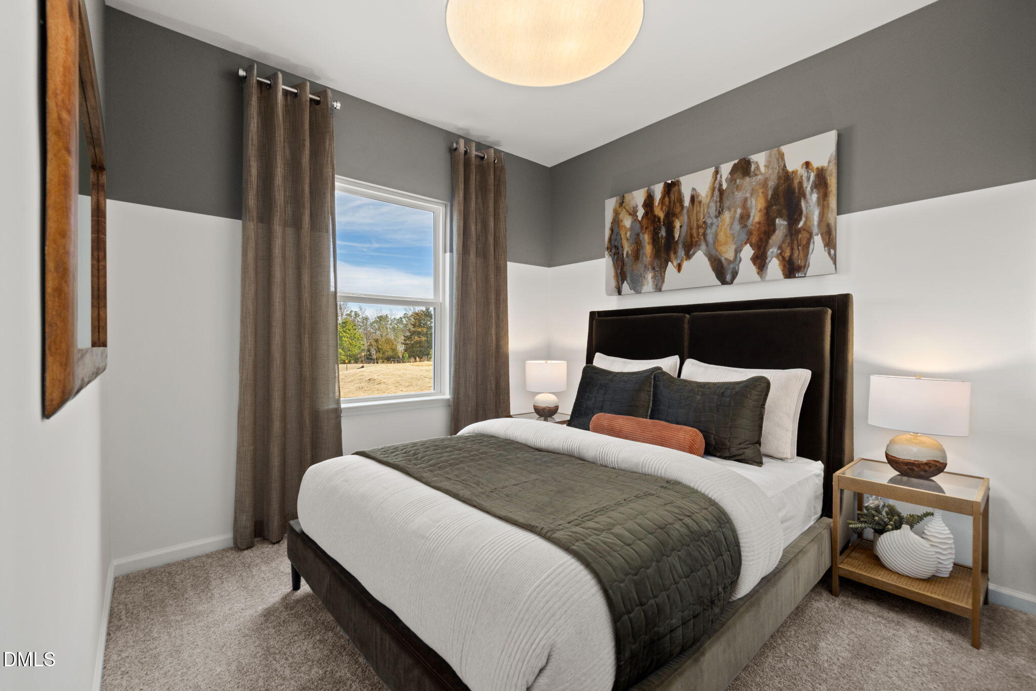 1451 Rowboat Road Apex, NC 27502 - Photo 14 of 20 a bedroom with a bed and painting on the wall