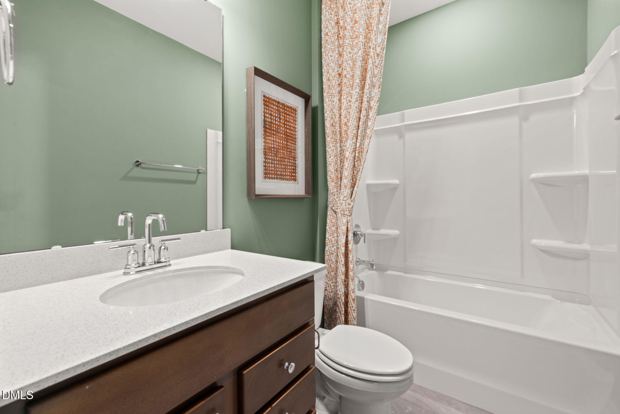 1451 Rowboat Road Apex, NC 27502 - Photo 15 of 20 a bathroom with a sink a toilet and shower