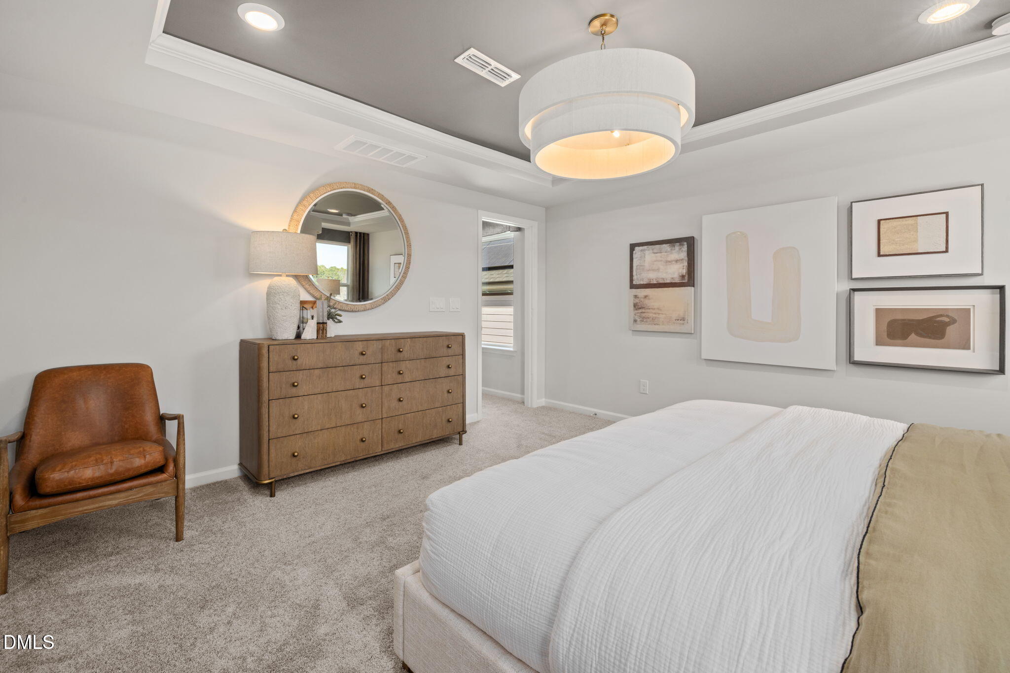 1451 Rowboat Road Apex, NC 27502 - Photo 8 of 20 a bedroom with a bed and a chair