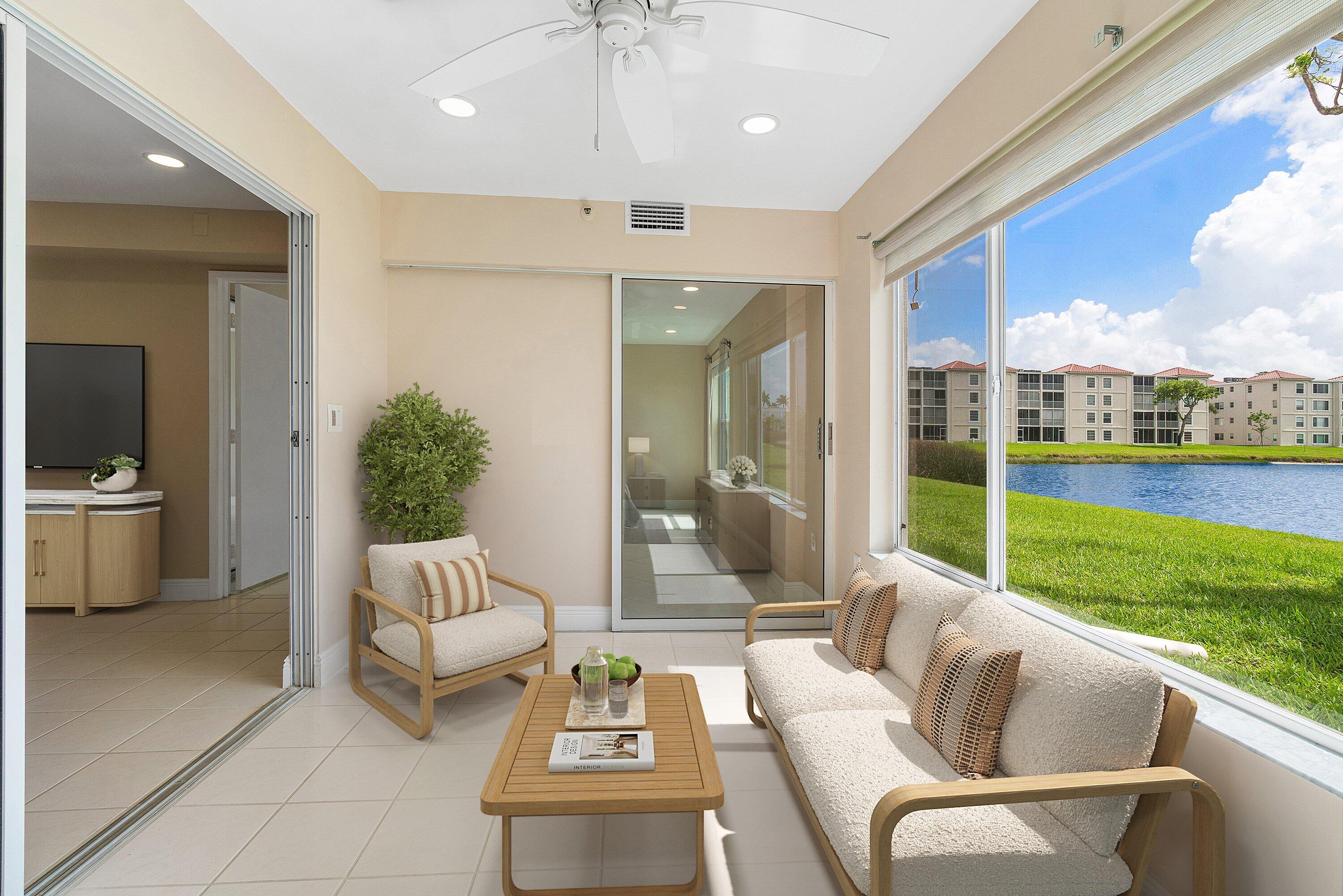 14096 Huntington Pointe Drive, Unit 106 Delray Beach, FL 33484 - Photo 8 of 47 a living room with furniture and a garden