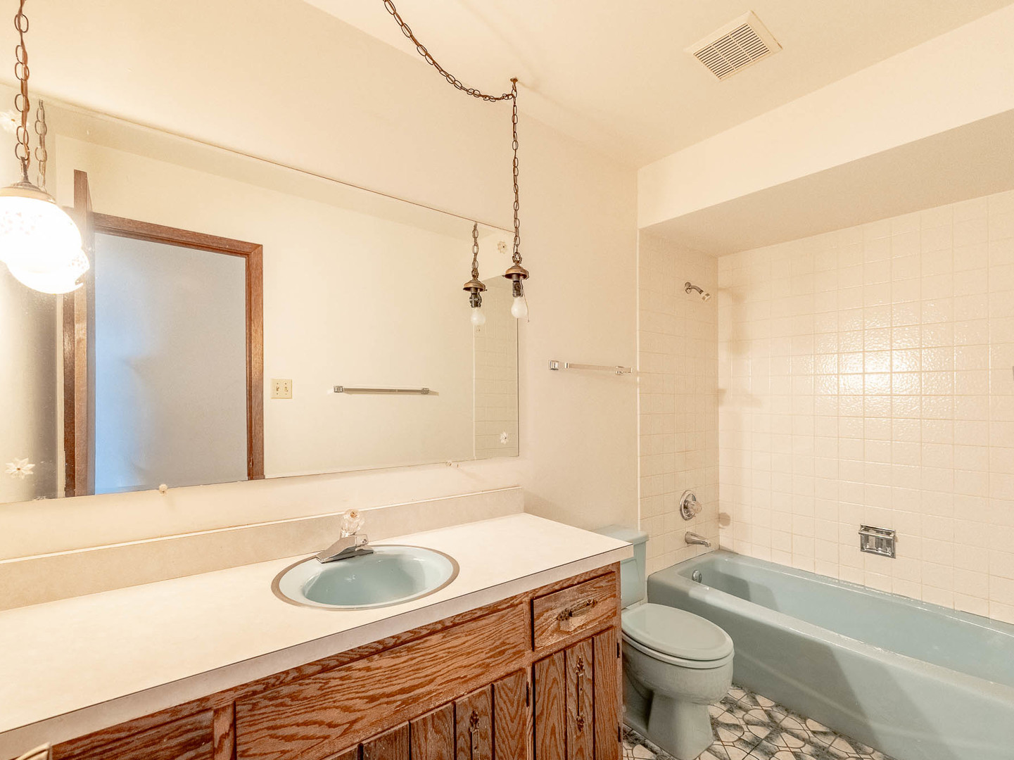 18549 Old Farm Road Lansing, IL 60438 - Photo 11 of 16 a bathroom with a granite countertop sink toilet a mirror and shower