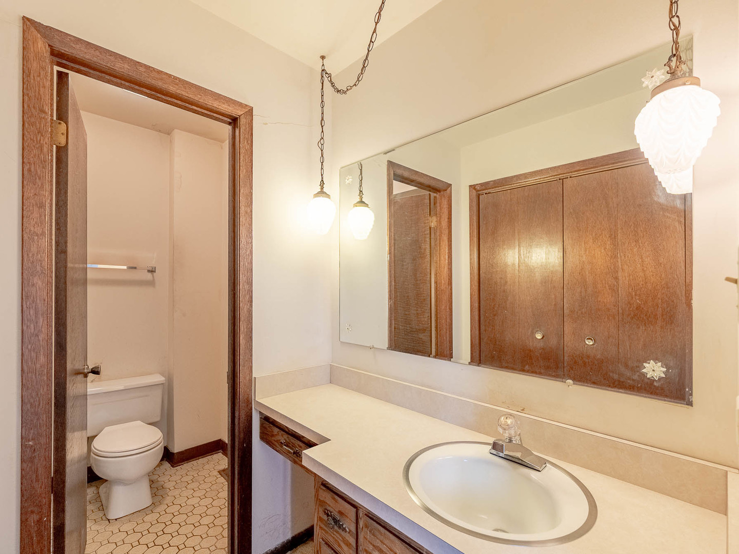 18549 Old Farm Road Lansing, IL 60438 - Photo 14 of 16 a bathroom with a sink a toilet and shower