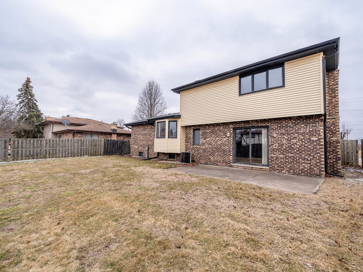 18549 Old Farm Road Lansing, IL 60438 - Photo 15 of 16 a front view of house with yard and car parked