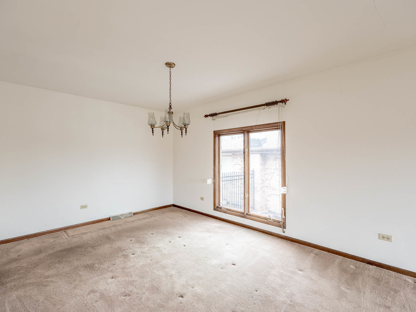 18549 Old Farm Road Lansing, IL 60438 - Photo 3 of 16 a view of an empty room with a window