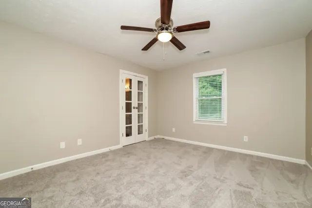 a bathroom with a toilet a sink and bathtub