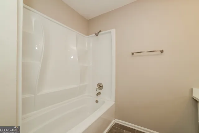 a bathroom with a bathtub