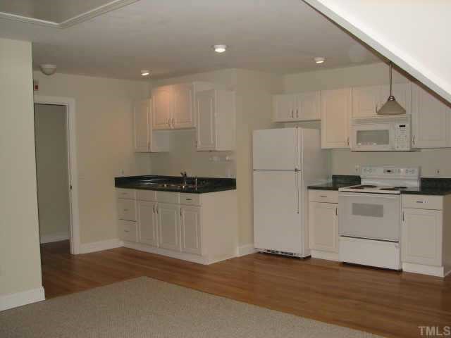 3205 Tanager Street Raleigh, NC 27606 - Photo 7 of 12 Huge apartment above garage has it's own kitchen, bath, new carpet. hardwood floors refinished.