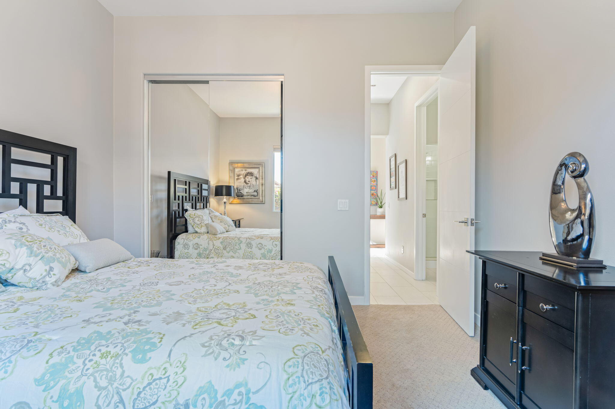 2 Pyramid Lake Court Rancho Mirage, CA 92270 - Photo 39 of 49 a bedroom with a bed and a flat tv screen on dresser