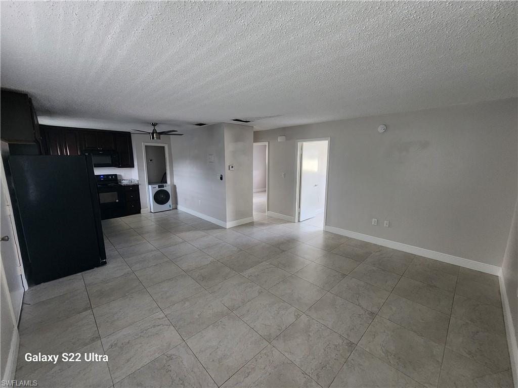 3325 Airport Road North, Unit N8 Naples, FL 34105 - Photo 6 of 22 a view of a livingroom with a furniture