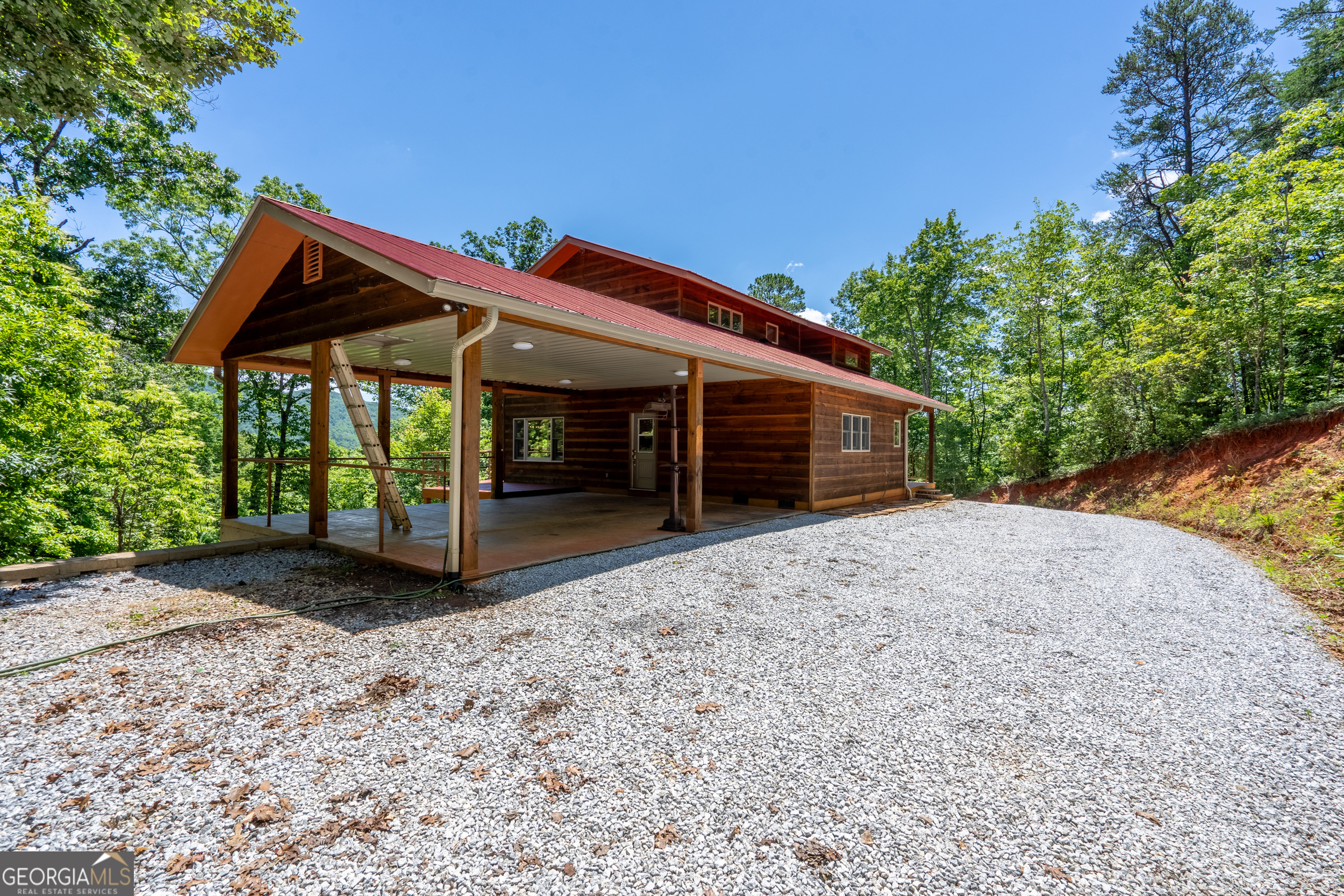 420 Hidden Acres Lane Clayton, GA 30525 - Photo 11 of 46 a view of a house with a yard