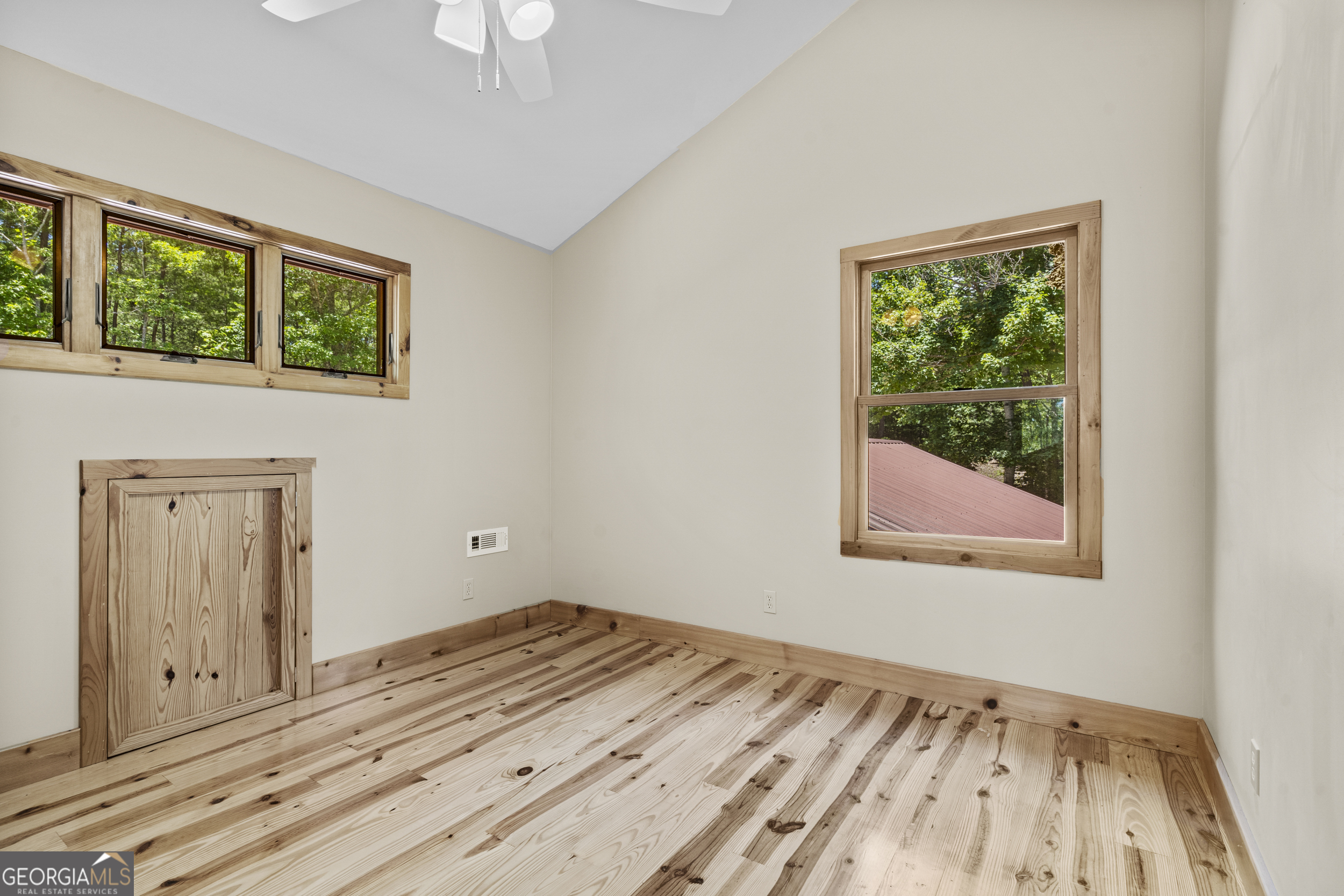 420 Hidden Acres Lane Clayton, GA 30525 - Photo 32 of 46 wooden floor in an empty room with a window
