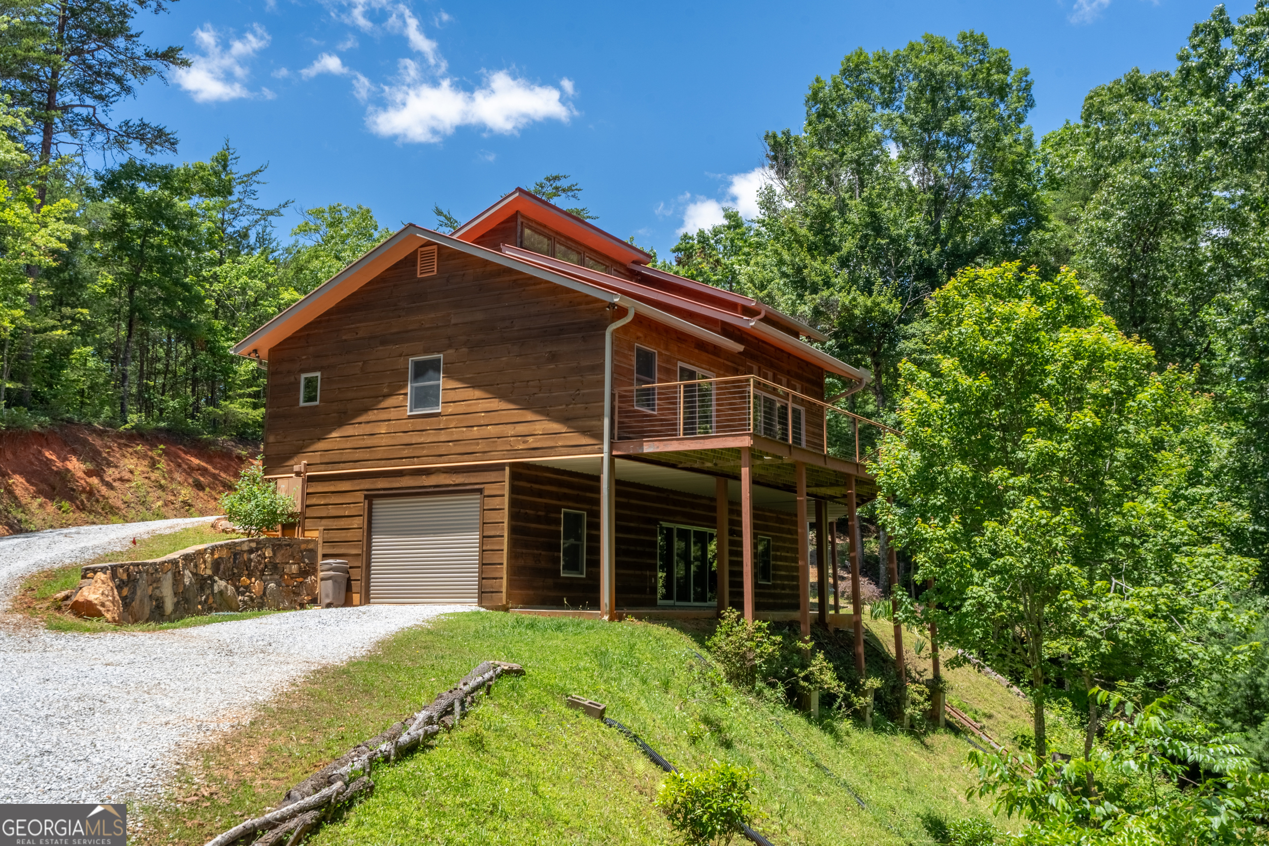 420 Hidden Acres Lane Clayton, GA 30525 - Photo 6 of 46 a front view of a house with a yard